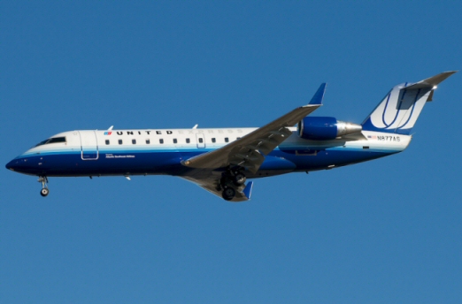 Retour cause problème de train d'un avion de American