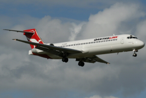 Le passager d'un avion de Qantas essaye d'ouvrir une porte