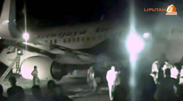 Sortie de piste d'un avion de Sriwijaya Air au poser