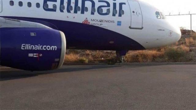 Sortie de taxiway au roulage d'un avion de Ellinair