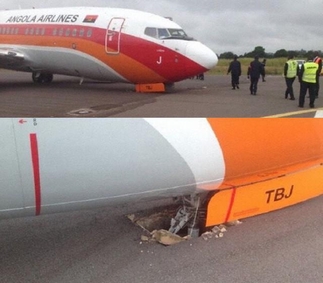 Le train avant d'un avion de Angola Air tombe dans un trou