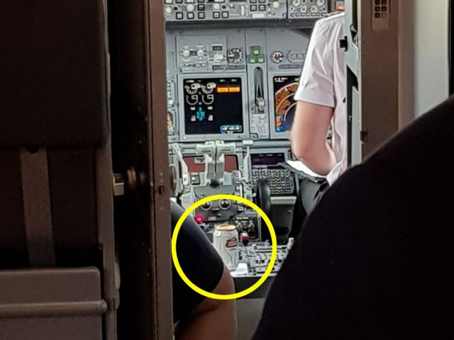 Une canette de bière dans le cockpit d'un avion de Jet2com