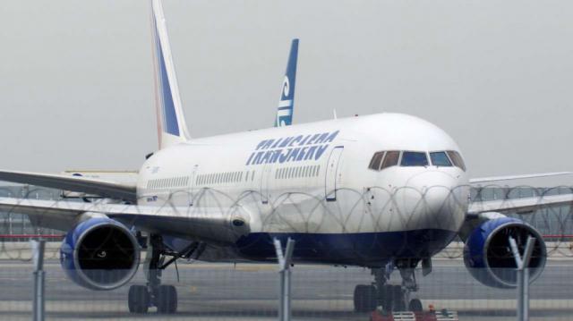 Un Boeing de Transaero à vendre sur l'aéroport de Hong Kong