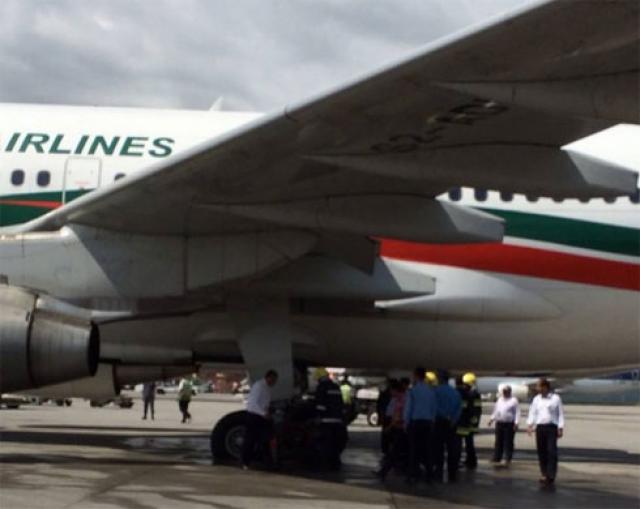 Incendie au poser sur les pneus d'un avion de Biman Airlines