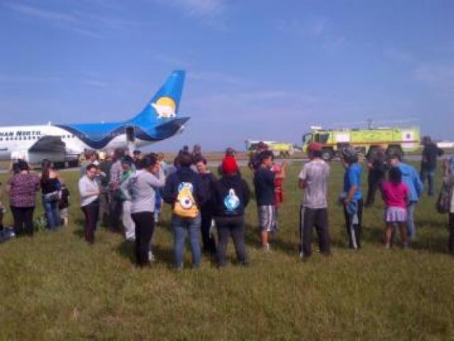 Évacuation cause feu d'APU d'un avion de Canadian North